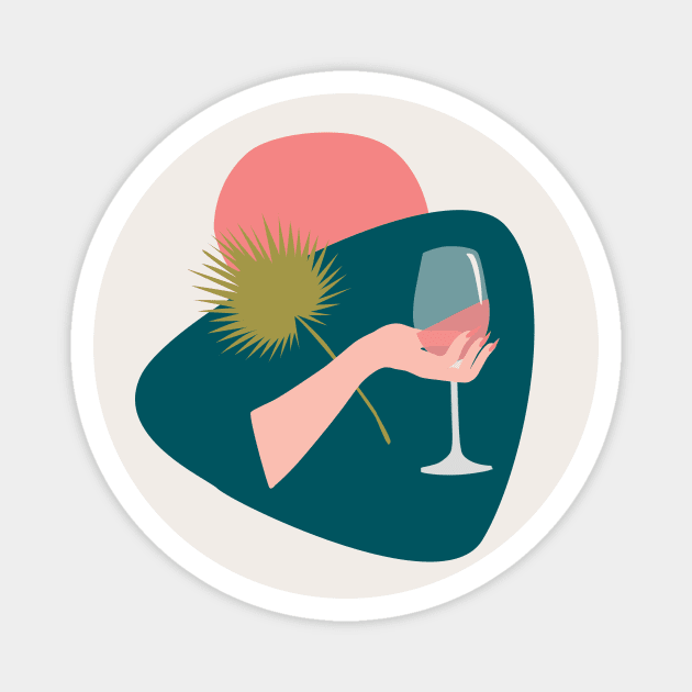 Hand with a glass of rose wine and leaf Magnet by NOSSIKKO